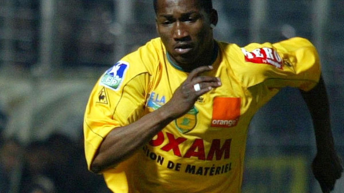 A portrait of Eric Djemba-Djemba at the annual club photocall at Old