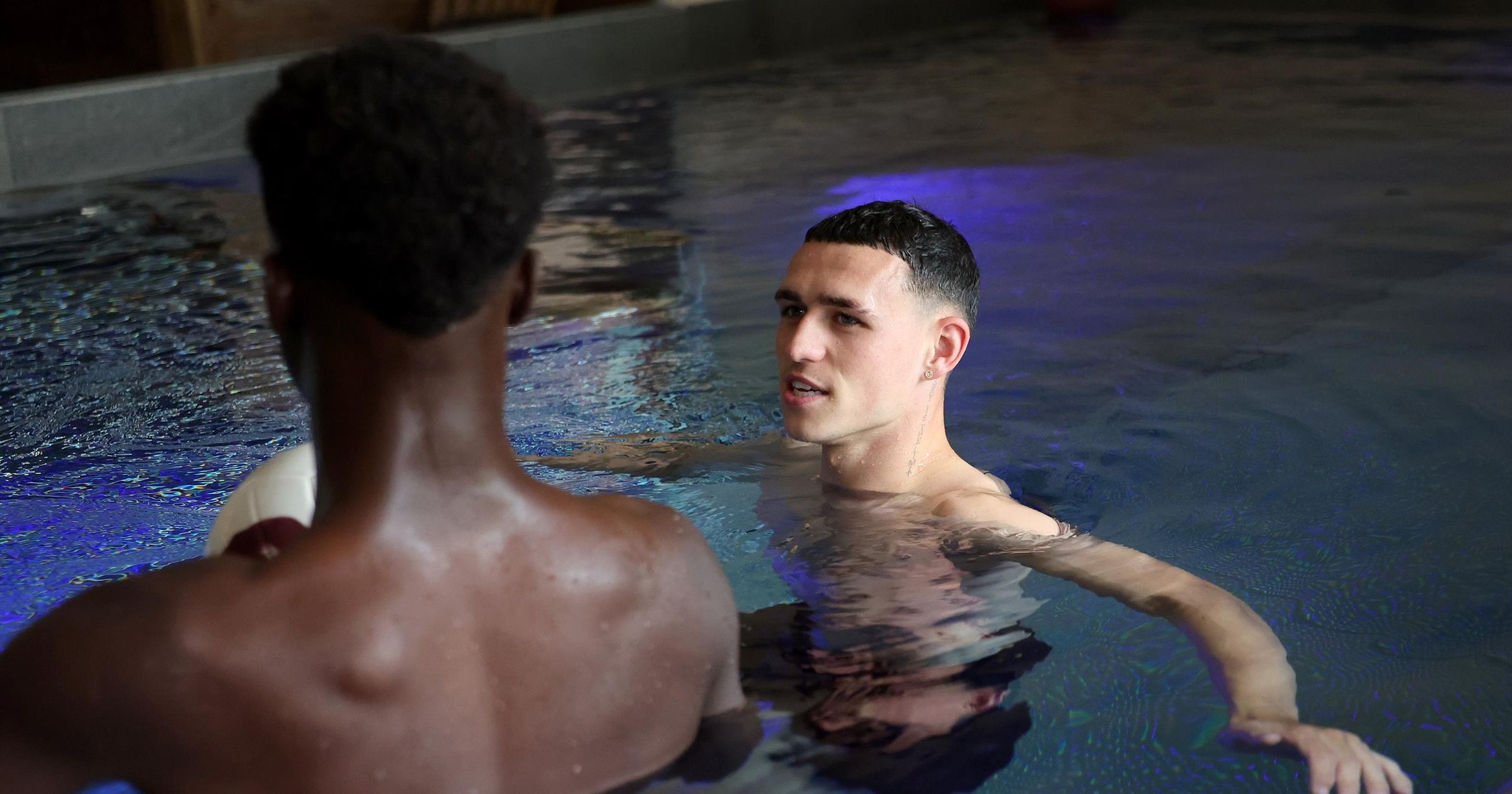 England players hit the pool after beating Netherlands and reaching ...