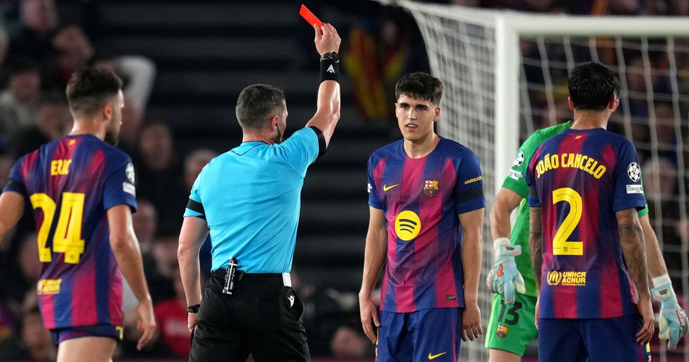 Barcelona down to 10 men on stroke of half-time as Pau Cubarsi sees red -  'The Atleti supporters celebrate'