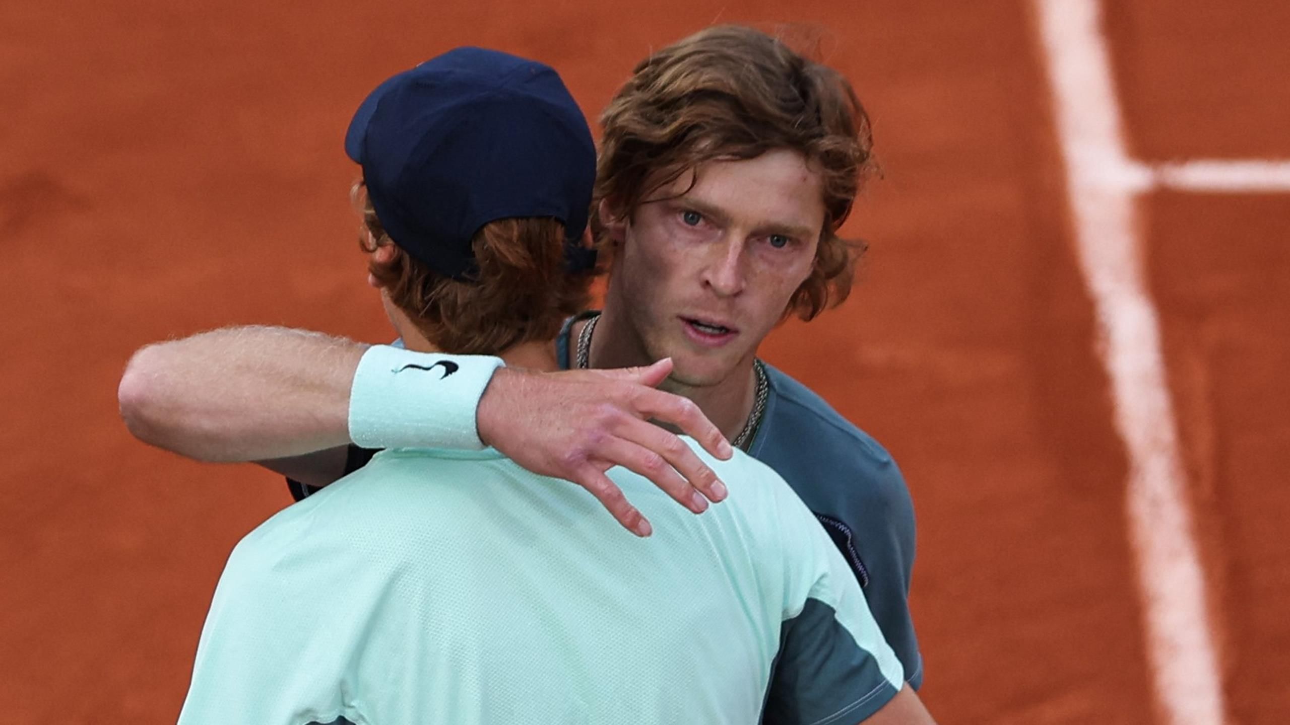 Andrey Rublev reaches French Open quarter-finals after Jannik Sinner ...