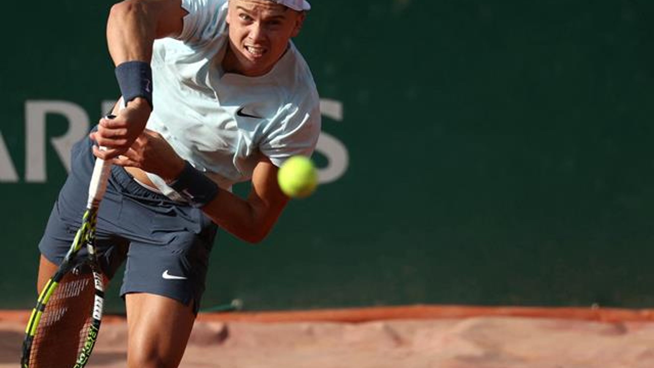Holger Rune takes opening set against Flavio Cobolli in French Open ...