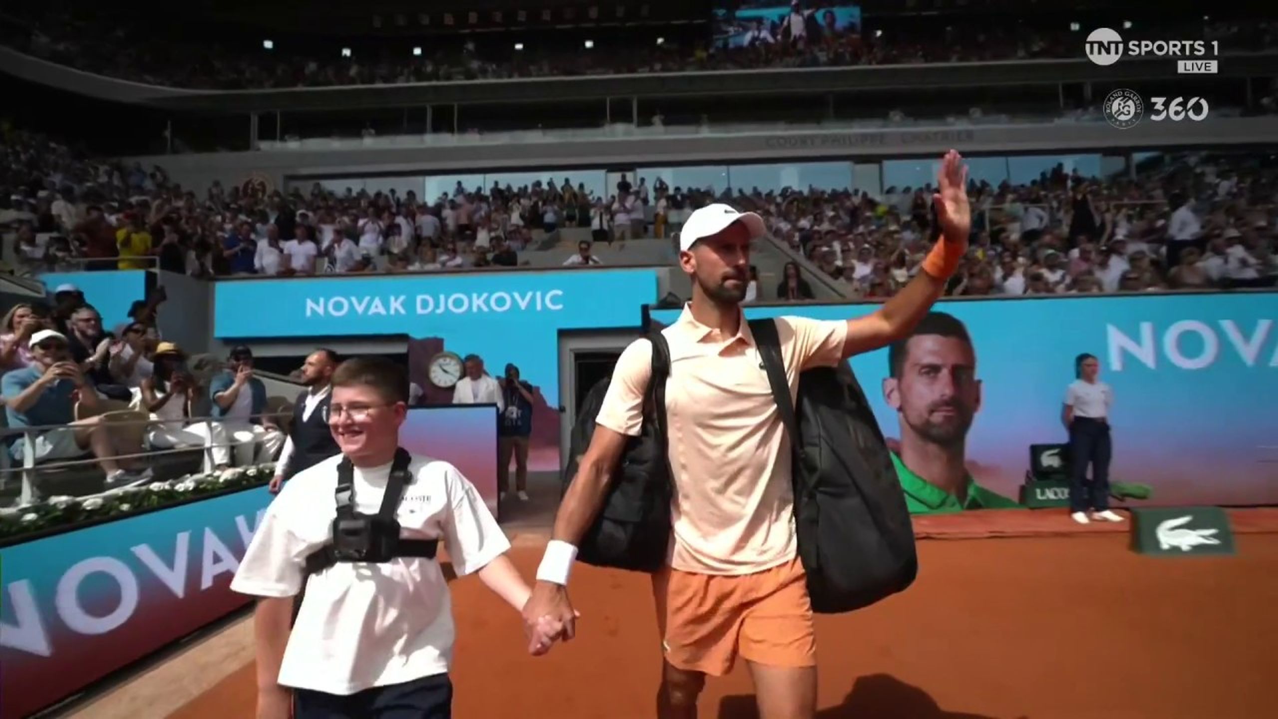 Watch as Novak Djokovic and Joao Fonseca walk out ahead of their ...