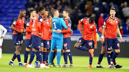 Lyon hold Lille to 2-2 draw in top-three thriller