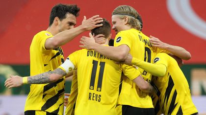 Dortmund cruise past Mainz to book Champions League spot
