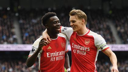 Arsenal hold on to beat Spurs in derby to increase lead at top of the table