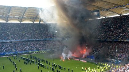 PHOTOS: Hamburg fans launch flares onto pitch following historic first relegation