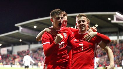 Last-gasp Woodburn wins it for Wales