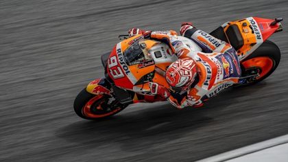 Marquez claims Sepang MotoGP pole despite fall