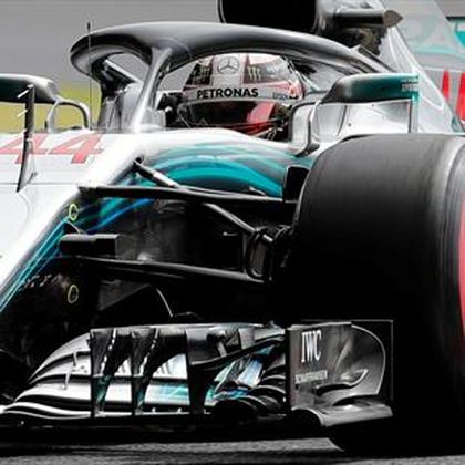 Hamilton takes pole in Japan on disappointing day for Ferrari